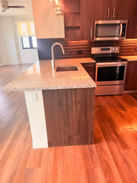 Finished kitchen and floors after a Canes Cleaners appointment